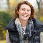 Portrait of a woman smiling in the park