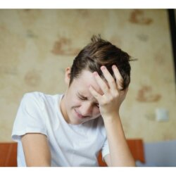 Teenager with headache